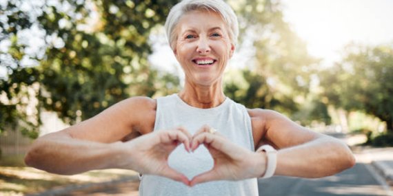 fitness-happy-and-heart-hands-of-old-woman-in-nature-after-running-for-health-wellness-and.jpg